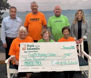 Front Row(l-r) – Patti Truelson, Donna Hungeling, Do Swenson. Back Row (l-r) - Bank of the Islands’ David Lowden and Lizzy Anda with Dave Truelson and Bill Hungeling (center).